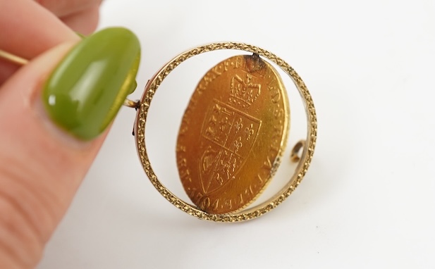 British gold coins, George III, gold guinea, 1794, in a swivel mount, plug at 12 o’clock position, otherwise good